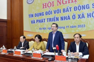Bộ trưởng Bộ Xây dựng Nguyễn Thanh Nghị phát biểu tại Hội nghị. Ảnh: SBV